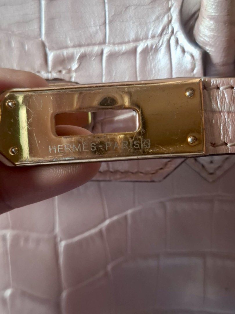 Hermes Birkin 25 Crocodile Embossed (Category: Tote Bags) located in General Santos City (Dadiangas). Submitted by mj_luxuries_bags_and_stuff (Listing ID 1469602930, Image 3). Description: Rare to find‼️25cm From Japan Surplus Shiny light pink crocodile embossed leather Riri zipper With light signs of usage No major issues .