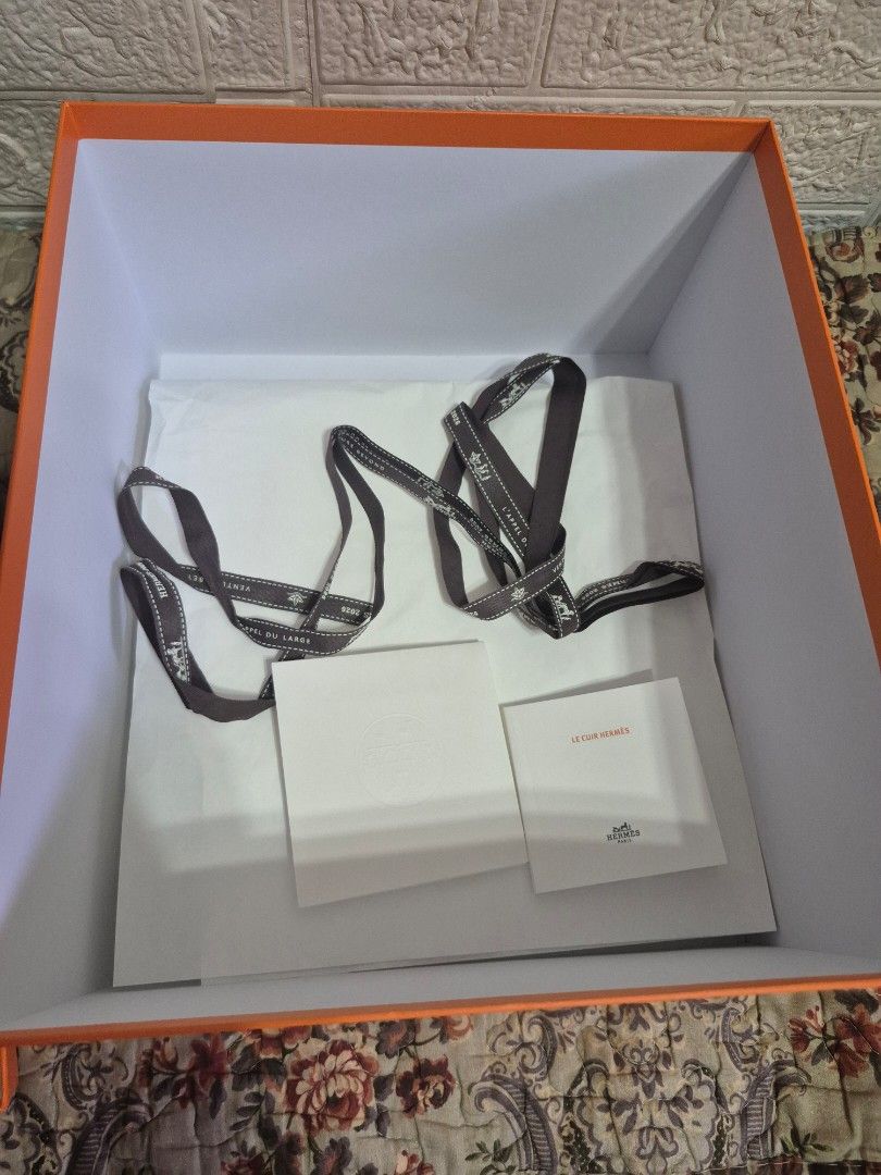 Hermes Kelly/birkin box (Category: Luxury Accessories) located in Pasig City. Submitted by luxbox_acc (Listing ID 1469643286, Image 2). Description: - Dimensions: approx. 12.5" x 11" with a 6" depth - Includes original inner white tissue paper, ribbon and care booklet - Clean and good as new PLEASE ALWAYS DOUBLE CHECK THE BOX SIZE AND THE DIMENSIONS OF YOUR HERMES BAG. WILL NOT ACCEPT RETURN AND REFUND. .