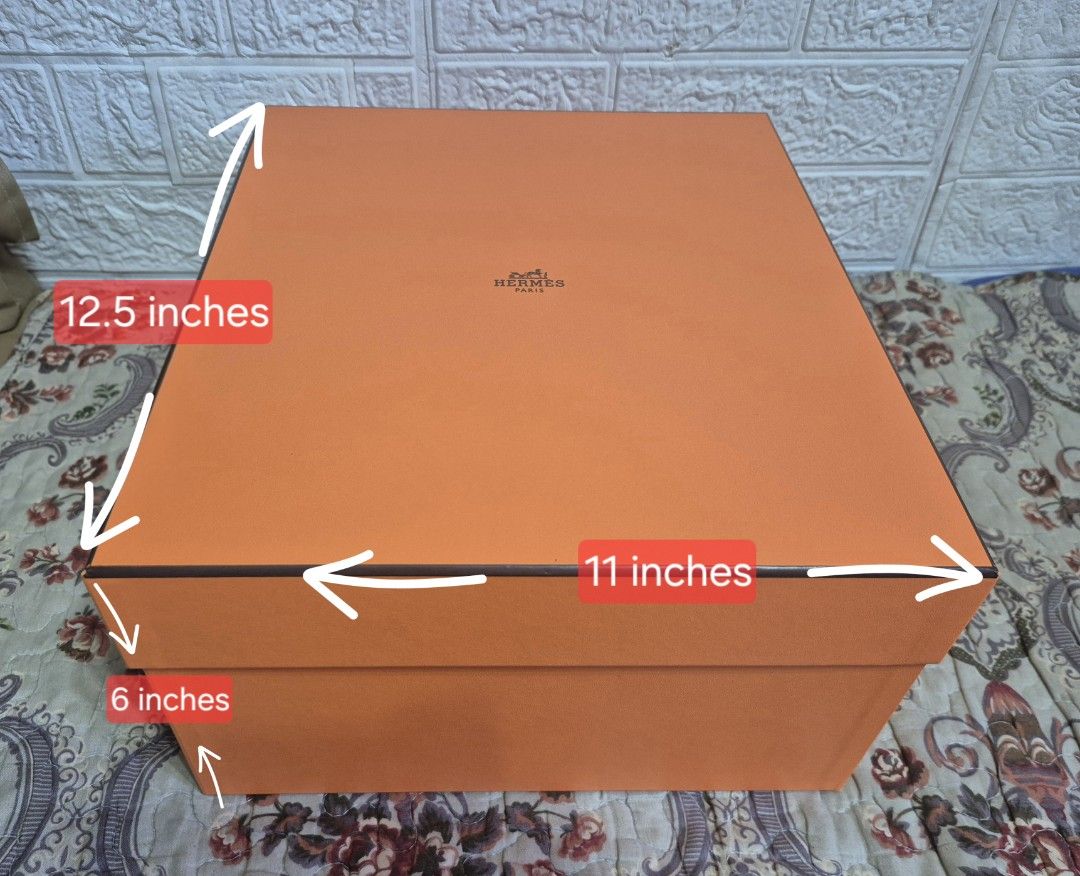Hermes Kelly/birkin box (Category: Luxury Accessories) located in Pasig City. Submitted by luxbox_acc (Listing ID 1469643286, Image 1). Description: - Dimensions: approx. 12.5" x 11" with a 6" depth - Includes original inner white tissue paper, ribbon and care booklet - Clean and good as new PLEASE ALWAYS DOUBLE CHECK THE BOX SIZE AND THE DIMENSIONS OF YOUR HERMES BAG. WILL NOT ACCEPT RETURN AND REFUND. .