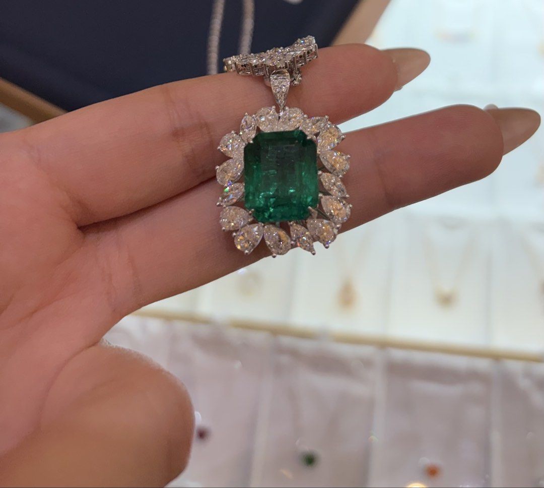 High grade Emerald Pendant (Category: Necklaces) located in Taguig. Submitted by labellearmoire2 (Listing ID 1469665594, Image 2). Description: Emerald is 11ct+ with grs report. Only minor oiled no enhancements/heat or treatments. Selling the pendant only! It can actually be turned to a ring as well if you own those removable band rings as well. 4.9M. Originally 6M. - Stunning green emerald pendant with clean stones and zero scratches - Surrounde