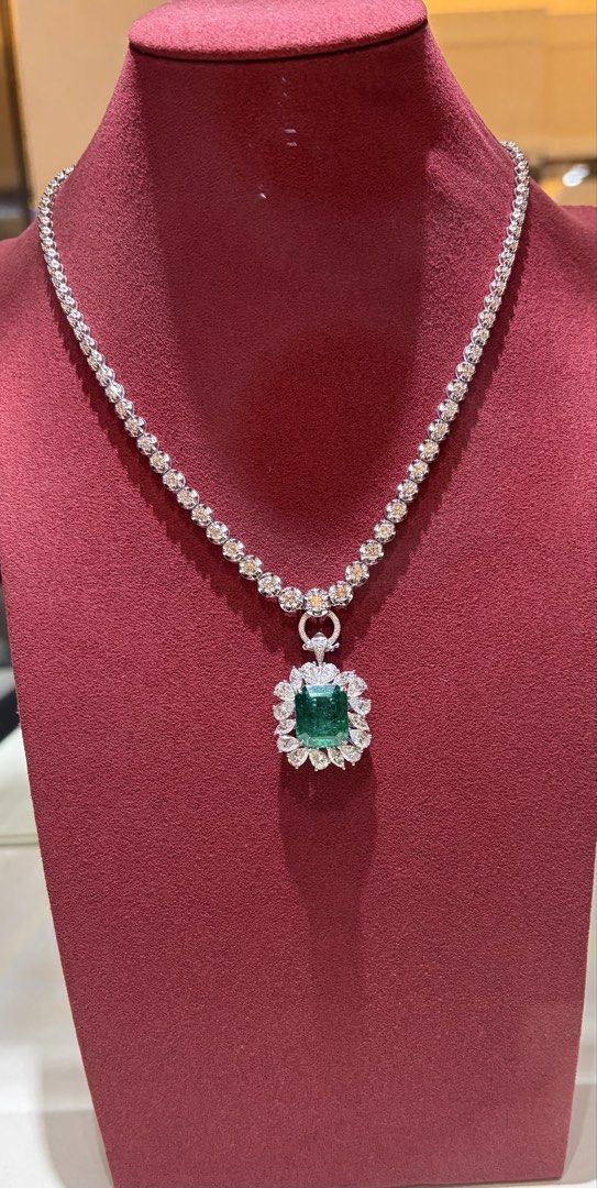 High grade Emerald Pendant (Category: Necklaces) located in Taguig. Submitted by labellearmoire2 (Listing ID 1469665594, Image 1). Description: Emerald is 11ct+ with grs report. Only minor oiled no enhancements/heat or treatments. Selling the pendant only! It can actually be turned to a ring as well if you own those removable band rings as well. 4.9M. Originally 6M. - Stunning green emerald pendant with clean stones and zero scratches - Surrounde