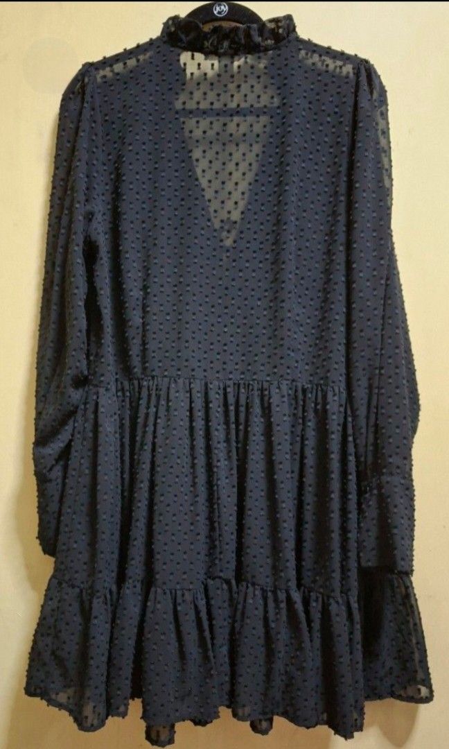 H&M Black Cocktail Dress (Category: Dresses) located in Manila. Submitted by thrifter_lifestyle (Listing ID 1469619865, Image 2). Description: Brand: H&M Long-Sleeves Ruffled V neck, tied Pull down Flowy and falls loose when worn Material: Textured thick sheer fabric, should be worn with inner Bust: 44" Waist: 42" Length: 37" (shoulder to hem) No issues, worn 1x 🙂 RFS: worn for an event, no need for it now.