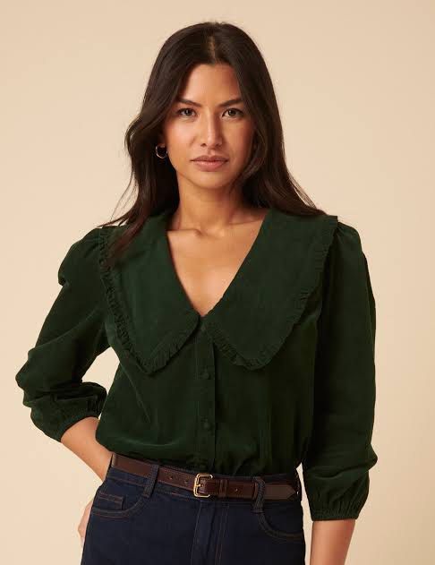H&M Black ruffled collar blouse (Category: Blouses) located in Muntinlupa City. Submitted by caroucella (Listing ID 1469619708, Image 3). Description: Classic Black Statement ruffled collar Long sleeves with button cuffs Lightweight and comfortable Tag says XS but this fits S-M.