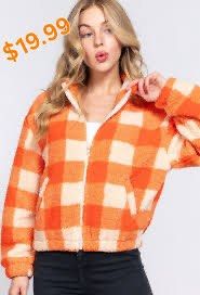 H&M Divided Orange Checkered Sherpa Fleece Jacket (Category: Coats, Jackets and Outerwear) located in Makati City. Submitted by marykay05 (Listing ID 1469619646, Image 1). Description: - Brand: H&M Divided - Size: XS - Design: Orange and white checkered pattern - Style: Quarter zip, high neck, cropped length, relaxed fit - Material: Super soft fuzzy fleece - Perfect for: Cold weather streetwear.