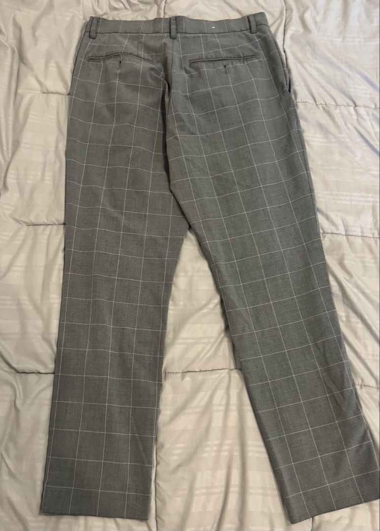 H&M Grey Plaid Slim Fit Pants (Category: Trousers) located in Manila. Submitted by vdoozy (Listing ID 1469648855, Image 2). Description: Brand: H&M - Fit: Slim Fit - Color: Grey - Pattern: Classic Plaid - Size: Waist 28, Length 30 Exact measurements: - Waist 28 inches - Inseam 28 inches - Full length 36 inches - Front rise 9 inches - Back rise 13 inches - Thigh width 10 inches - Leg opening 7 inches - Hip width 17 inches Location: Katipunan, Quez