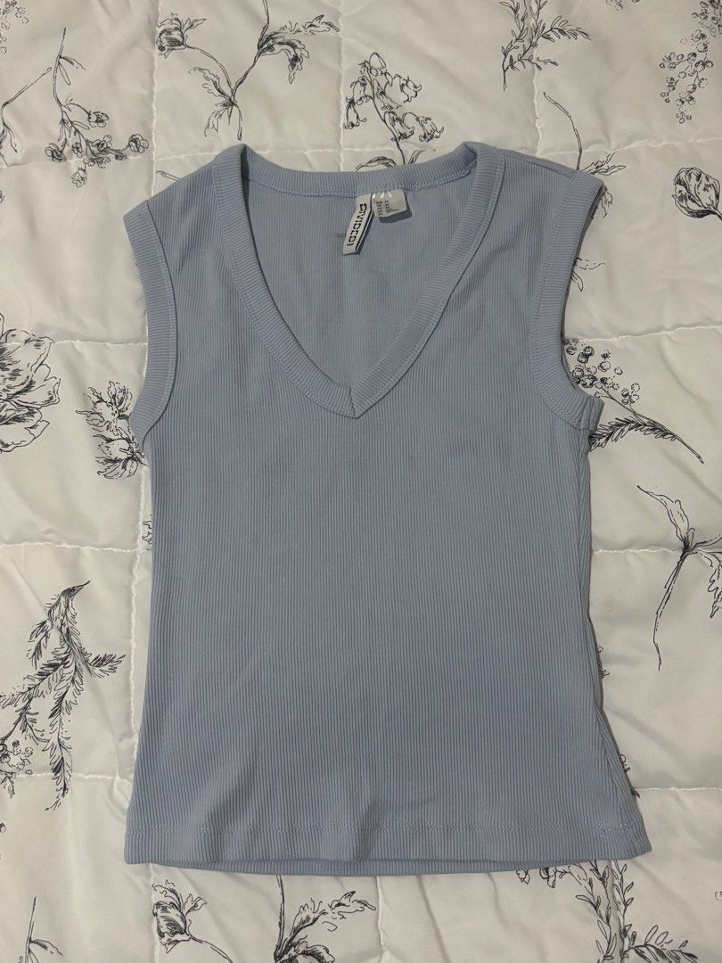 H&M Light Blue V-Neck Ribbed Tank Top (Category: Sleeveless) located in Cainta. Submitted by thriftedbymimi_ (Listing ID 1469675460, Image 1). Description: - Brand: Divided by H&M price is negotiable, bundle deals available. send a message MOP: Gcash/Maribank/Gotyme/Bank Transfer MOD: lalamove .