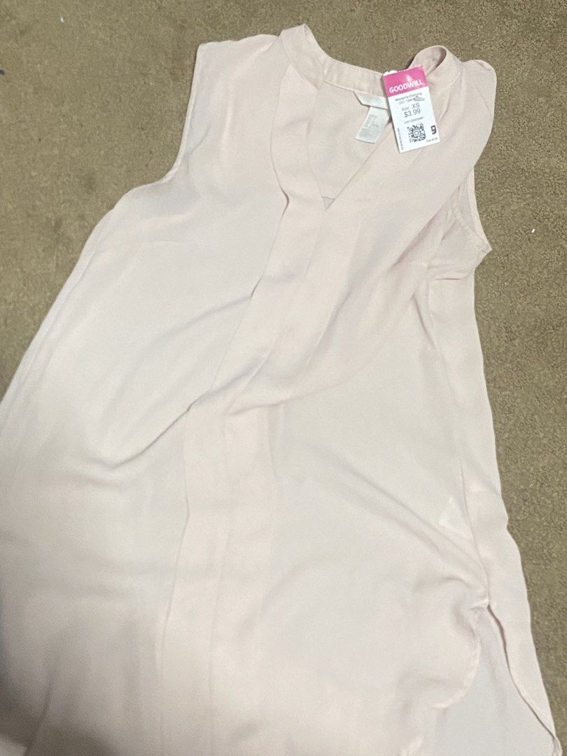 H&M Light Pink Sleeveless Blouse Size US 2 (Category: Sleeveless) located in Manila. Submitted by kuya_moto (Listing ID 1469649483, Image 1). Description: Light pink sleeveless blouse from H&M. Size US 2 / EUR 32. Made of 100 percent polyester. Lightweight material with a v-neckline and draped front detail. Easy to style for work or casual outings. Machine washable care instructions inside. Clean and ready to wear..