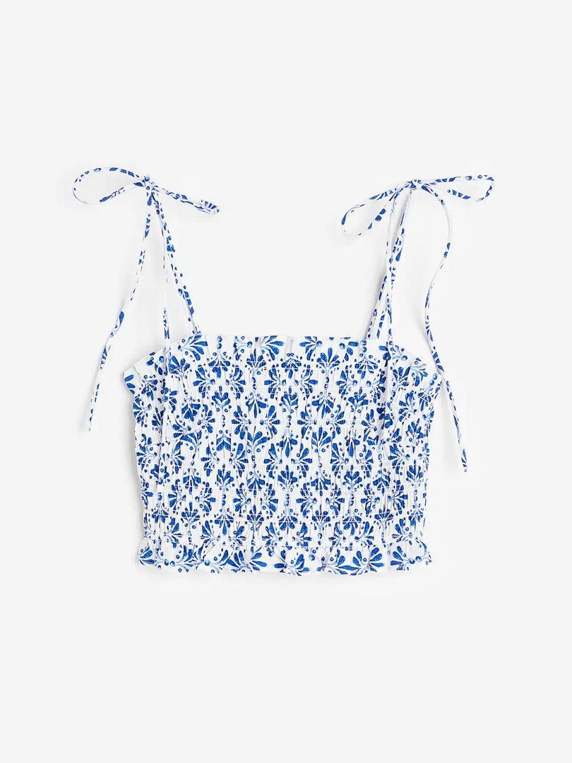 H&M Smocked Light Blue Crop Top in Small (Category: Blouses) located in Quezon City. Submitted by hazpreloved (Listing ID 1469707447, Image 3). Description: Size small Almost new Great for the beach! Tags: h&m, cotton on, zara, mango, love bonito.