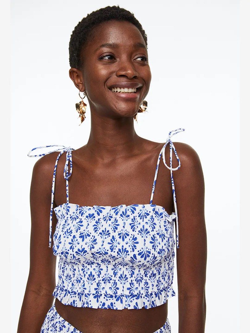 H&M Smocked Light Blue Crop Top in Small (Category: Blouses) located in Quezon City. Submitted by hazpreloved (Listing ID 1469707447, Image 1). Description: Size small Almost new Great for the beach! Tags: h&m, cotton on, zara, mango, love bonito.