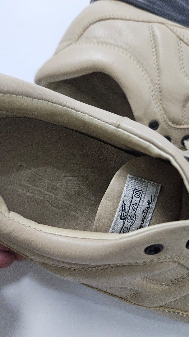 Hogan Interactive Beige Leather Sneakers (Category: Sneakers) located in Alfonso. Submitted by jbcamet (Listing ID 1469702815, Image 2). Description: - Brand: Hogan Interactive - Material: Premium beige leather - Design: Classic lace-up front with signature H side logo - Sole: Chunky black rubber sole for added comfort and height - Authenticity: Interior tag and stamped insoles visible - Style: Versatile neutral colorway that pairs easily with ev