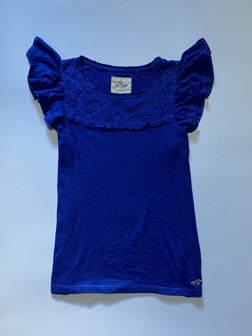 Hollister Ruffle Sleeve Top (Category: Blouses) located in Manila. Submitted by lexia_swrdrbfinds (Listing ID 1469706234, Image 1). Description: ⋆ 𐙚 ̊ Hollister Ruffle Sleeve Top 🌸 𝓈𝒾𝓏ℯ ℴ𝓃 𝓉𝒶𝑔: medium 🩷 𝓁ℯ𝓃𝑔𝓉𝒽: 22 🌷 𝓌𝒾𝒹𝓉𝒽: 16 🎀 𝒸ℴ𝓃𝒹𝒾𝓉𝒾ℴ𝓃: 8.5/10 🫧 𝒻𝓁𝒶𝓌𝓈: see pic ~ pin holes 𝓅𝓇𝒾𝒸ℯ: 399 ✦ 𝓅𝓁𝓊𝓈 𝓈𝒽𝒾𝓅𝓅𝒾𝓃𝑔 𝒻ℯℯ.