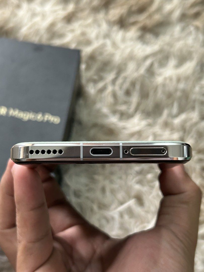 HONOR Magic 6 Pro 5G 12/512 (Category: Android Others) located in Caloocan City. Submitted by bouesantos06 (Listing ID 1469597753, Image 3). Description: Honor Magic 6 Pro 12/512gb Opi Green Snapdragon 8 Gen 3 180 mp 100X ZOOM 50mp Main Camera Complete with box and 100w Charger 100+ CC only. Good as new ₱27,000 Fixed for sale or swap to your IOS or Android Devices. North Caloocan area. Malaria,Tala,Barracks,Bagong silang Pwede LBC COD or COP. or 