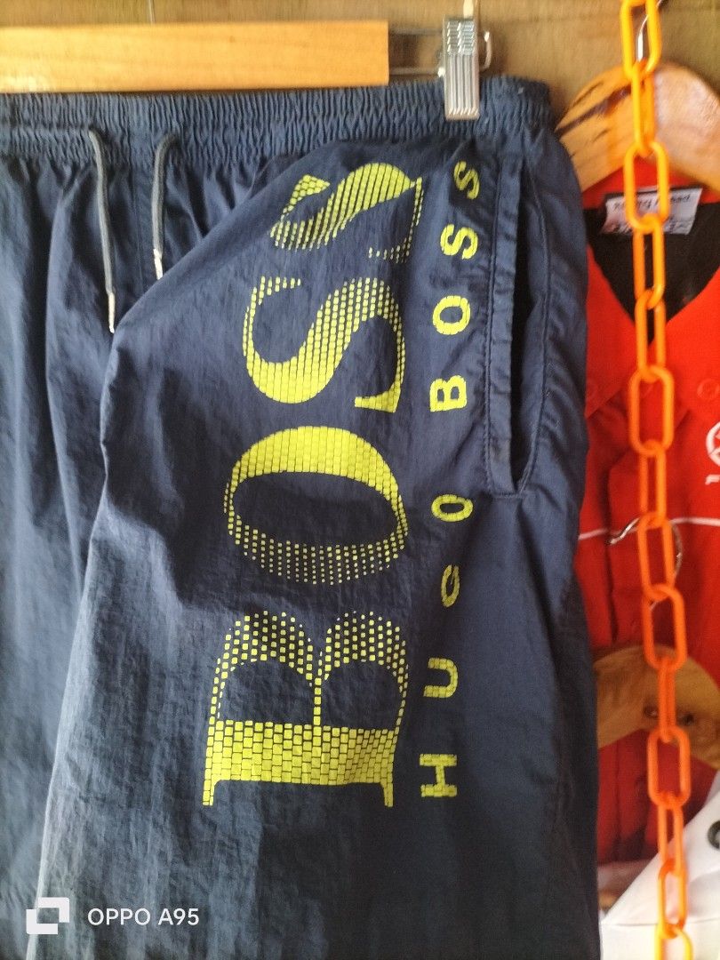 Hugo boss (Category: Shorts) located in Baler. Submitted by jaydeebaltazar (Listing ID 1469642940, Image 3). Description: good condition pa pangit lng picture ko. issue niya tinanggal lng ung brif niya. pero quality pa to personal. nylon cya size: 28to34 above the knee.