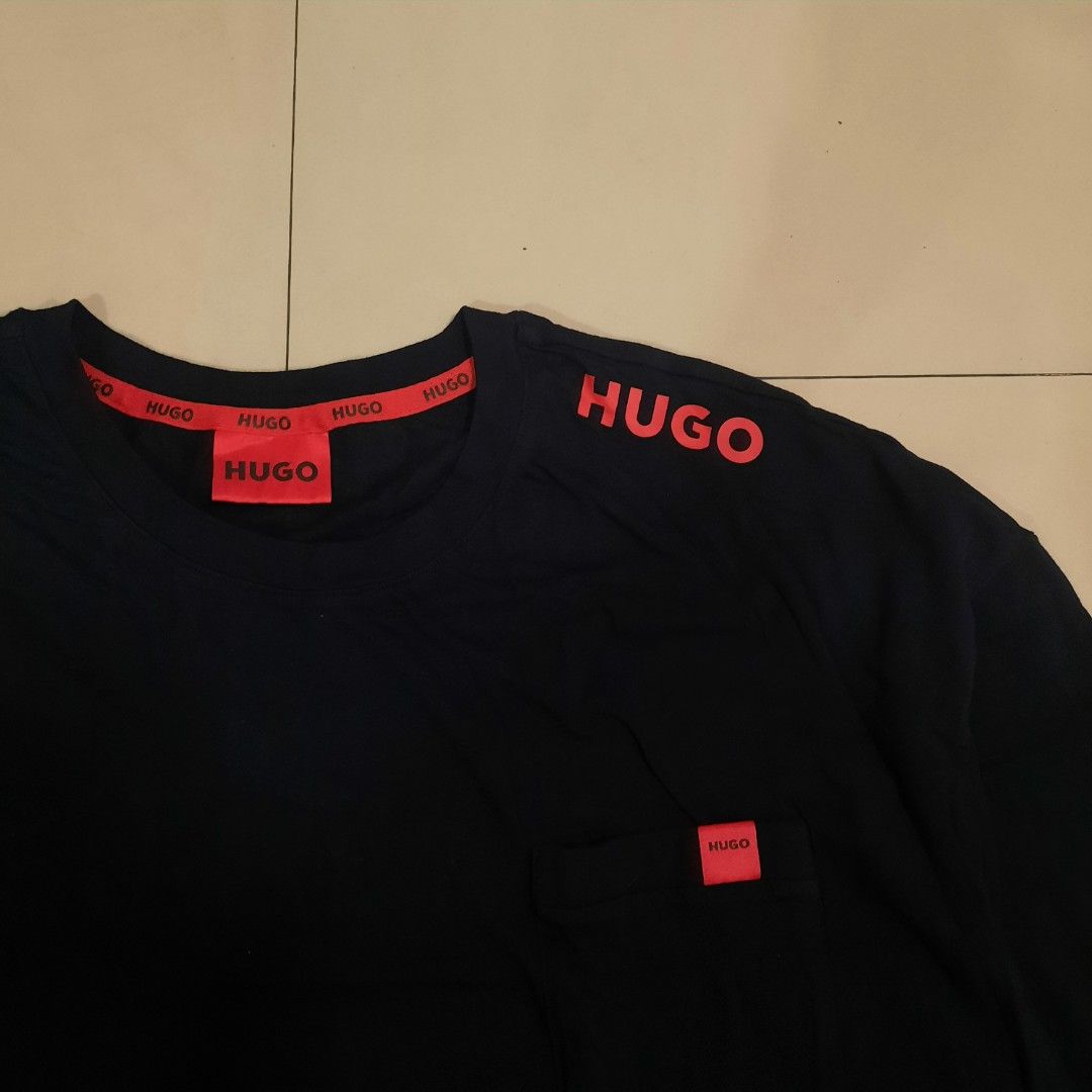 Hugo Boss Logo Label Sweatshirt (Category: Tshirts & Polo Shirts ) located in Cebu City. Submitted by archivalia.me (Listing ID 1469646154, Image 2). Description: Hugo Boss Logo Label Sweatshirt Large Width 23 Length 29 Good as New No Issue Price dm + sf Loc: Cebu City.