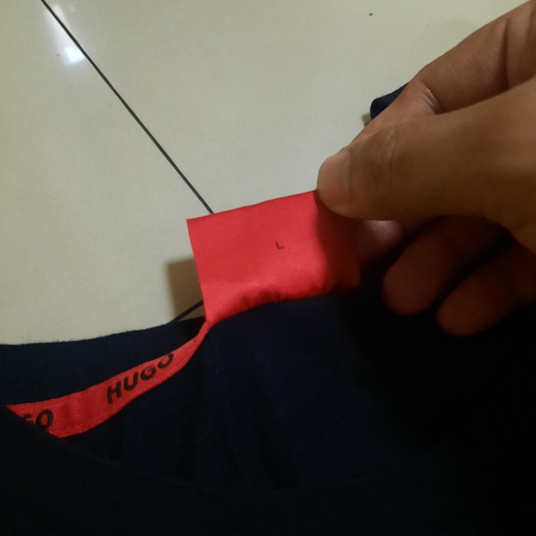 Hugo Boss Logo Label Sweatshirt (Category: Tshirts & Polo Shirts ) located in Cebu City. Submitted by archivalia.me (Listing ID 1469646154, Image 3). Description: Hugo Boss Logo Label Sweatshirt Large Width 23 Length 29 Good as New No Issue Price dm + sf Loc: Cebu City.
