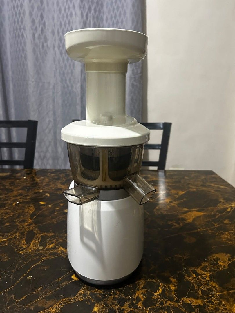 Hurom Slow Juicer White (Category: Juicers, Blenders & Grinders) located in Taguig. Submitted by lhadychinitah (Listing ID 1469681827, Image 3). Description: - Authentic Hurom slow juicer in classic white - Motor base works perfectly and cord wraps neatly - Includes hopper, strainer basket, auger, spinning brush, and juice bowl - Ideal for daily fresh juices and homemade nut milks - Easy to disassemble and clean - Condition: Shows normal surface 