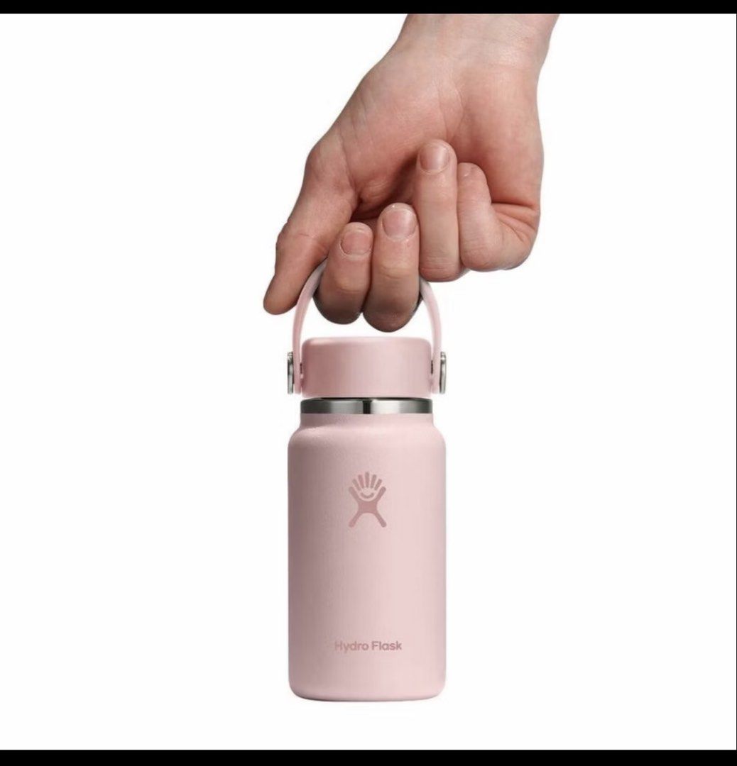 Hydro Flask Pink Water Bottle 200ml (Category: Water Bottles & Tumblers) located in Muntinlupa City. Submitted by valkyrie_pvn (Listing ID 1469674033, Image 2). Description: - Bought at 1.2k - Used more or less 4x onlyyy - RFS: Planning to buy a mug instead - Color: Pink - Cap: with handy strap for easy carrying.