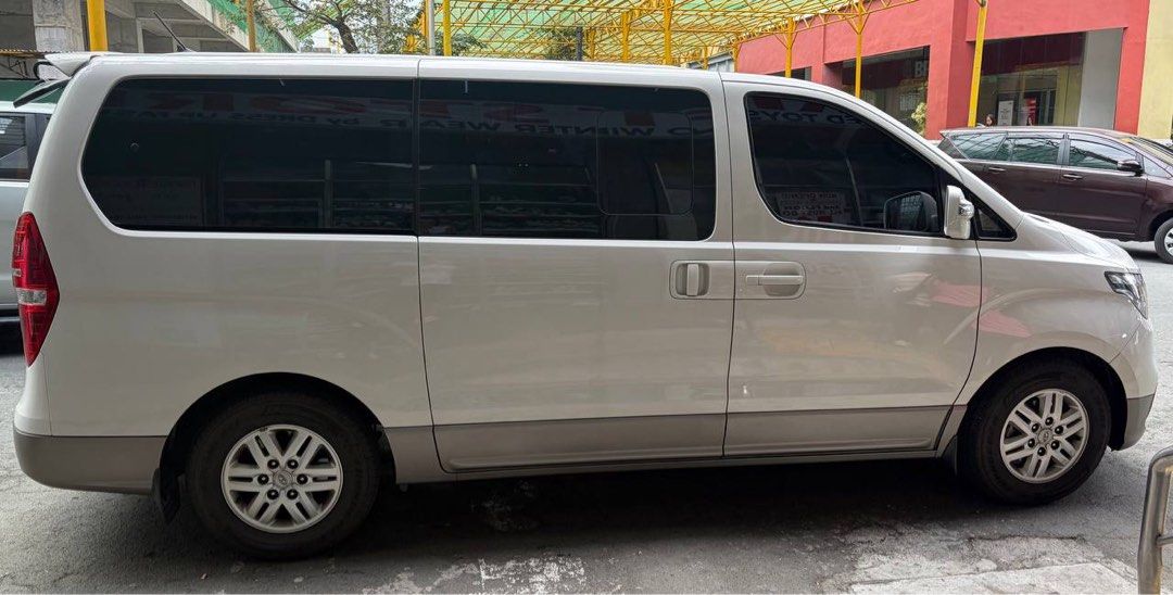 Hyundai Starex (Category: Used Cars) located in Quezon City. Submitted by docbato (Listing ID 1469616565, Image 2). Description: FOR SALE: 2019 HYUNDAI GRAND STAREX PLATINUM 💰 Asking Price: ₱1,100,000 — Negotiable Looking for a spacious, comfortable, and premium family or executive van? Check out this 2019 Hyundai Grand Starex Platinum! ✨ Vehicle Details • Model: 2019 Hyundai Grand Starex Platinum • Engine: 2.5L CRDi Turbo Diesel • Mileage: 65,0