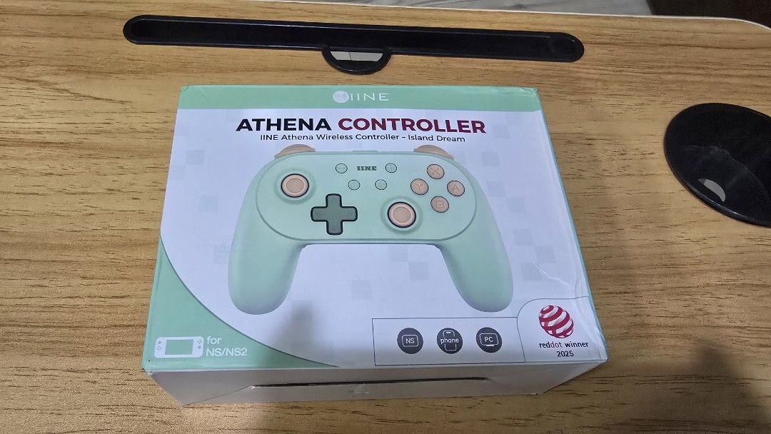 IINE Athena Wireless Controller Island Dream (Category: Controllers) located in Caloocan City. Submitted by FlexiMart (Listing ID 1469655628, Image 1). Description: - Item: IINE Athena Wireless Controller (Model L1267) - Condition: Brand new - Colorway: Island Dream - Awards: Red Dot Winner 2025 - Compatibility: Nintendo Switch, phones, and PC - Key Features: Motion-sensing support and charging indicator light.