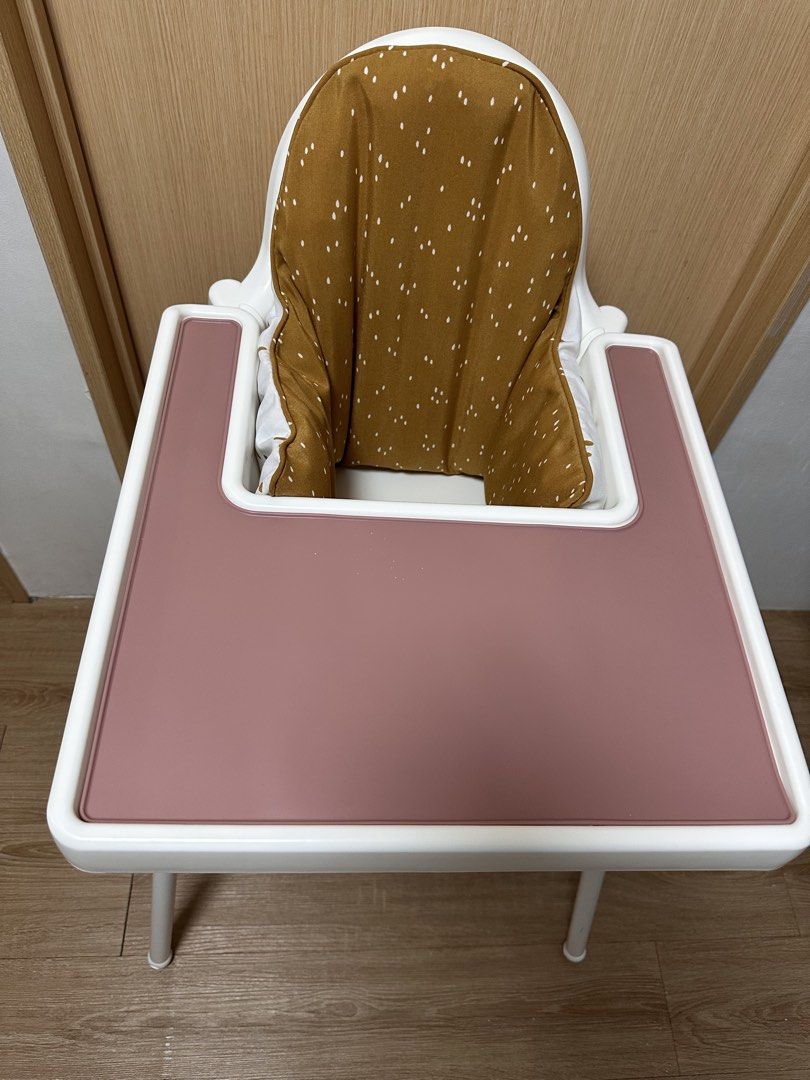 Ikea Antilop High Chair (Category: Baby High Chairs) located in Pasig City. Submitted by april.yap (Listing ID 1469621814, Image 2). Description: - Ikea Antilop High Chair with Tray - Ikea Antilop Silicone Tray Mat - Pink - Ikea Antilop Supporting Cushion - Mustard - Bollie Baby Bamboo Footrest - Grey.