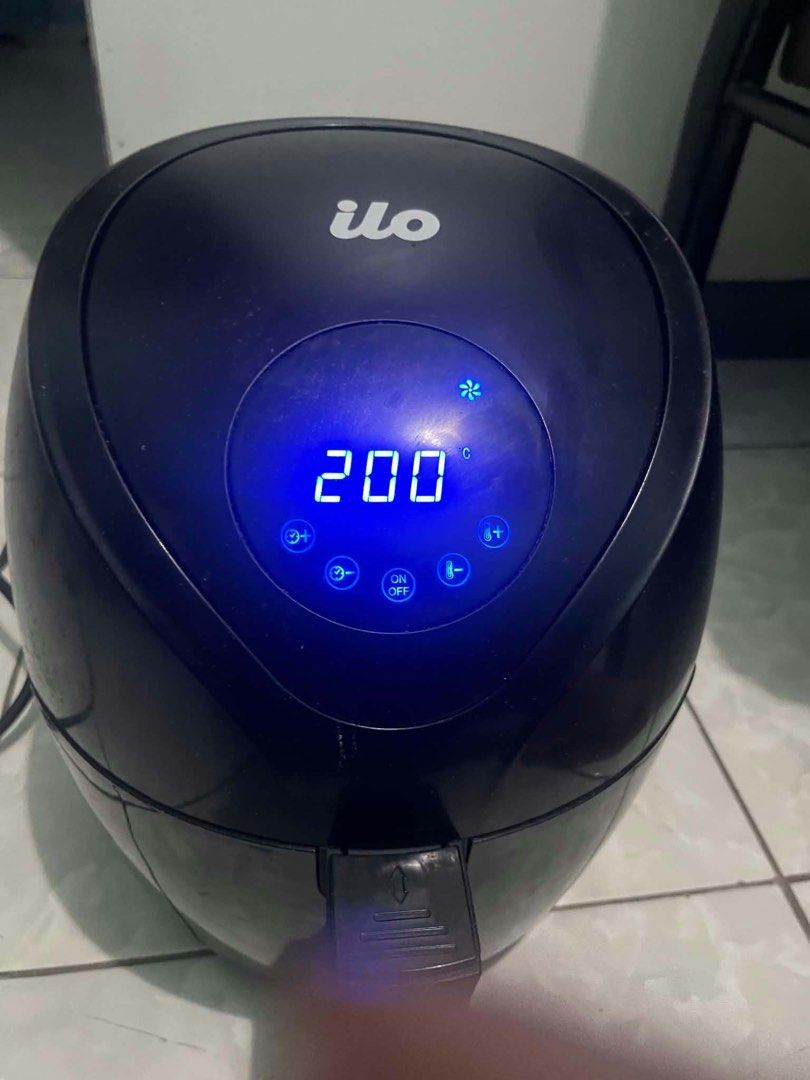 ilo Digital Air Fryer Black (Category: Fryers) located in San Jose del Monte. Submitted by thepinkcart_ (Listing ID 1469689042, Image 3). Description: - Brand: ILO Digital Air Fryer - Color: Sleek Black - Features: Modern top touchscreen panel, temp settings up to 200°C, and pull-out basket with secure release button - Benefits: Ideal for oil-free cooking, quick snacks, and healthy meals - Inclusion: Power cord included - Condition: Clean, excell