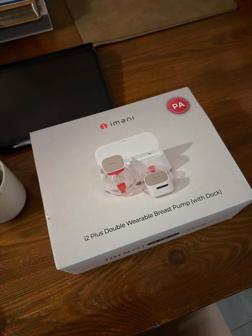 Imani i2 Plus Double Wearable Breast Pump with Dock (Category: Breastfeeding & Bottle Feeding) located in Antipolo. Submitted by nikkirebellon (Listing ID 1469581477, Image 1). Description: - Imani i2 Plus double wearable breast pump set - Includes charging dock and original box - All parts thoroughly cleaned and laid out as pictured - Portable, hands-free design for convenient pumping on the go - Complete set with dual motors, collection cups, f