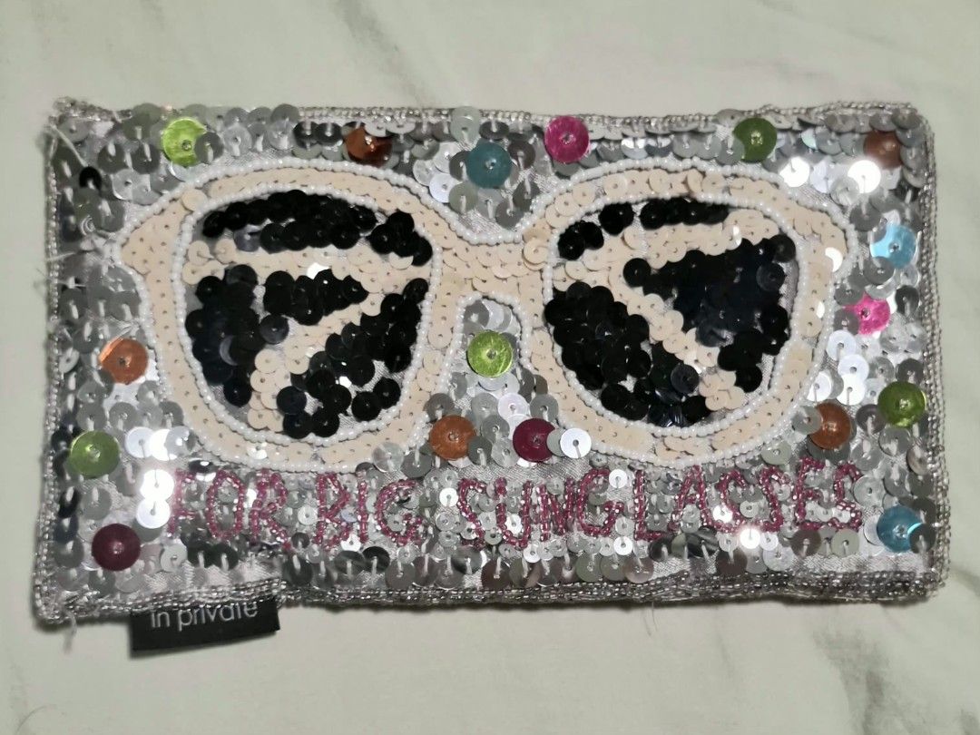 In Private Sequin Sunglasses Case (Category: Sunglasses & Eyewear) located in Don Carlos. Submitted by PphiXi_Finds (Listing ID 1469728018, Image 1). Description: - Stunning silver sequin sunglasses case featuring a cute beaded glasses design - Reads 'FOR BIG SUNGLASSES' in stylish pink lettering on the front - Designed with a smooth grey satin back and a soft lined interior for extra protection - Complete with an 'in private' brand tag on the bo