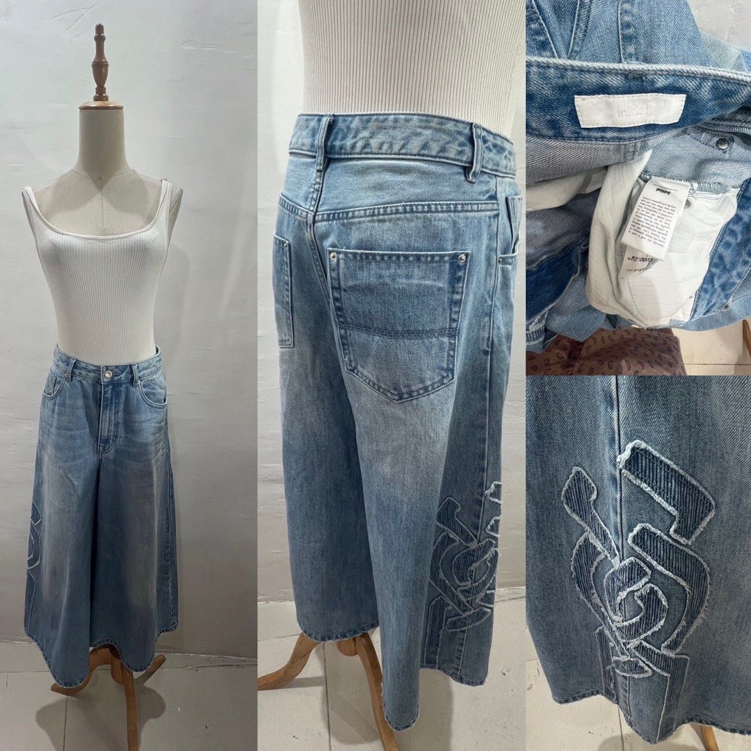 Initial Light Wash Denim Culottes with Embroidered Side Details (Category: Jeans) located in Bacolod City. Submitted by bhabissagal-05763 (Listing ID 1469707027, Image 1). Description: - Brand: Initial - Style: Light wash denim culottes with a wide-leg silhouette and mid-rise waist - Details: Unique embroidered geometric pattern on the lower side legs - Features: Back patch pockets and standard button-zip fly - Material: Sturdy, classic denim wei