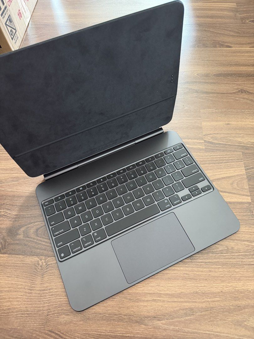 iPad Pro 13” case (Category: Cases & Covers) located in Kuala Lumpur. Submitted by farahco (Listing ID 1469752067, Image 1). Description: For Sale: iPad Pro 13-inch Magic Keyboard & Case 🖤 Premium Apple keyboard case for iPad Pro 13-inch, featuring a built-in keyboard, large trackpad, and magnetic folio design. ✨ Sleek and elegant design ⌨️ Comfortable typing experience 🖱️ Large trackpad for easy navigation 🛡️ Protective case with adjustable v