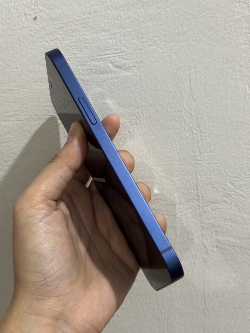 Iphone 12 128GB (Category: iPhone 12 Series) located in Makati City. Submitted by judyya__ (Listing ID 1469674016, Image 3). Description: For sale only! Iphone 12 128GB Globelocked No replaced parts No issues, just signs of usage and minimal dents Batt Health: 77% Updated to iOS 27 Meetup around BGC Unit and rep cord only .