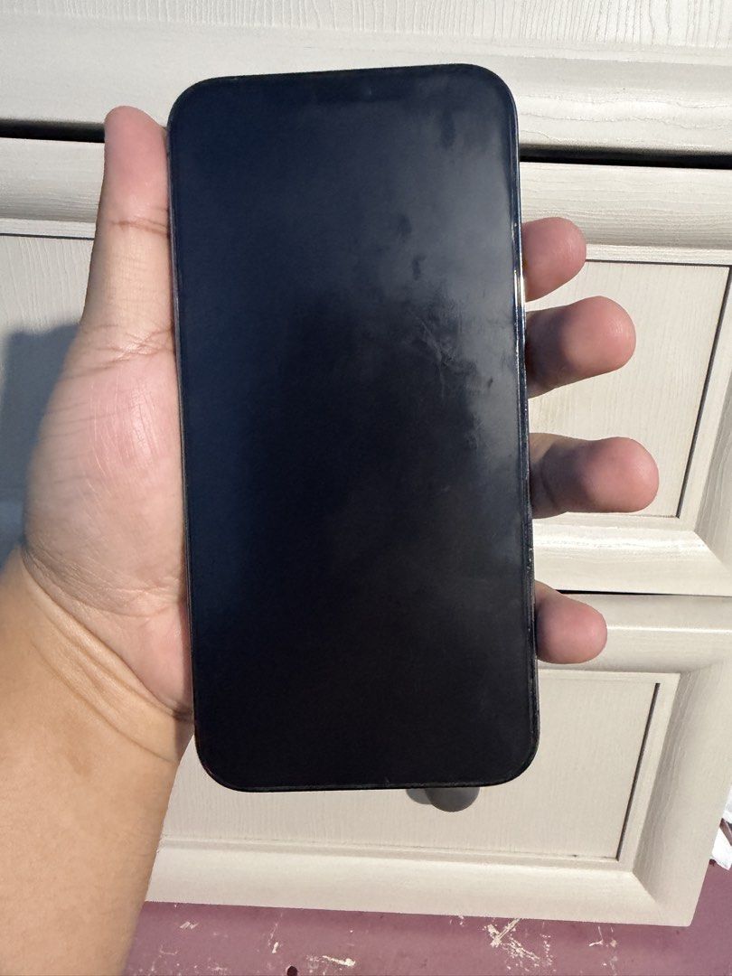 IPHONE 12 PRO MAX 256 GB (Slightly Nego) (Category: iPhone 12 Series) located in Mandaluyong City. Submitted by kaarl_ (Listing ID 1469574739, Image 3). Description: WITH ORIGINAL APPLE EARPODS 🤑 - Brand/Model: Apple iPhone 12 Pro Max - Storage Capacity: 256GB - Color: Black / Graphite - Condition: Excellent, well-maintained with clean screen, glass back, and polished sides - Inclusions Original box Original Apple EarPods with Lightning connecto