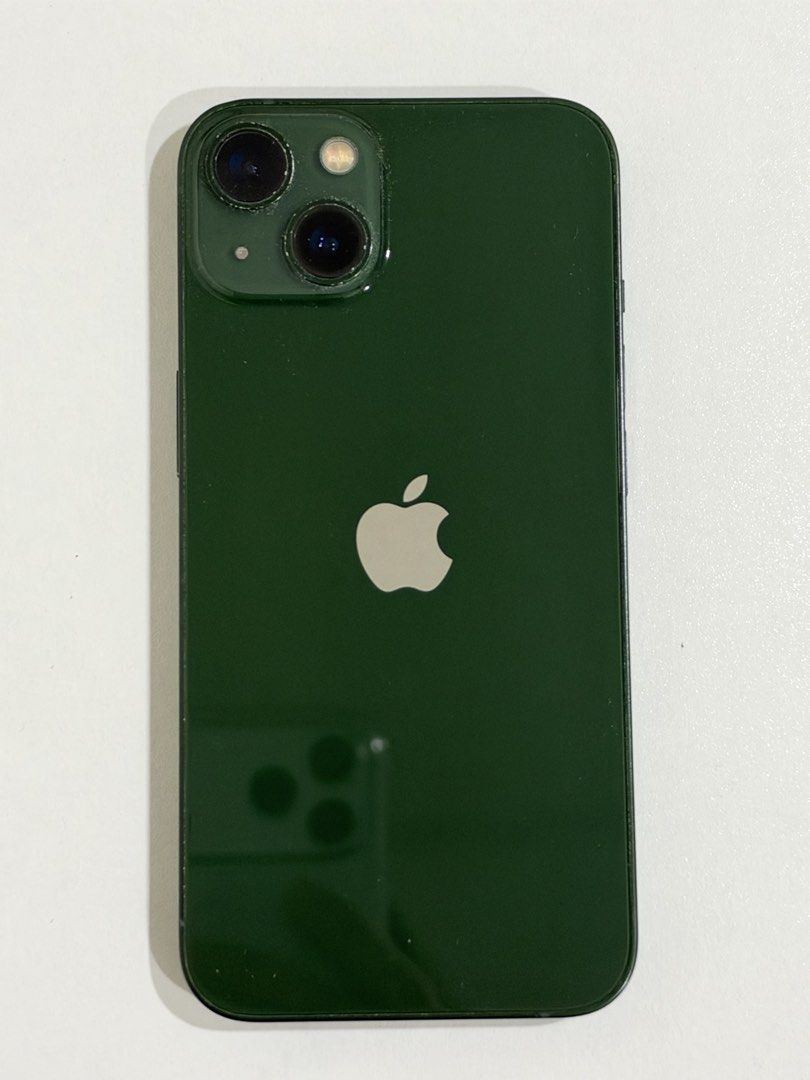 iPhone 13 (Category: iPhone 13 Series) located in Balagtas. Submitted by mrl_pchc (Listing ID 1469673930, Image 1). Description: Color: Green Storage: 128gb Batt Health: 75% No history of repair w/ slight dents and scratches Inclusion: Original box Original lightning cable Cases.
