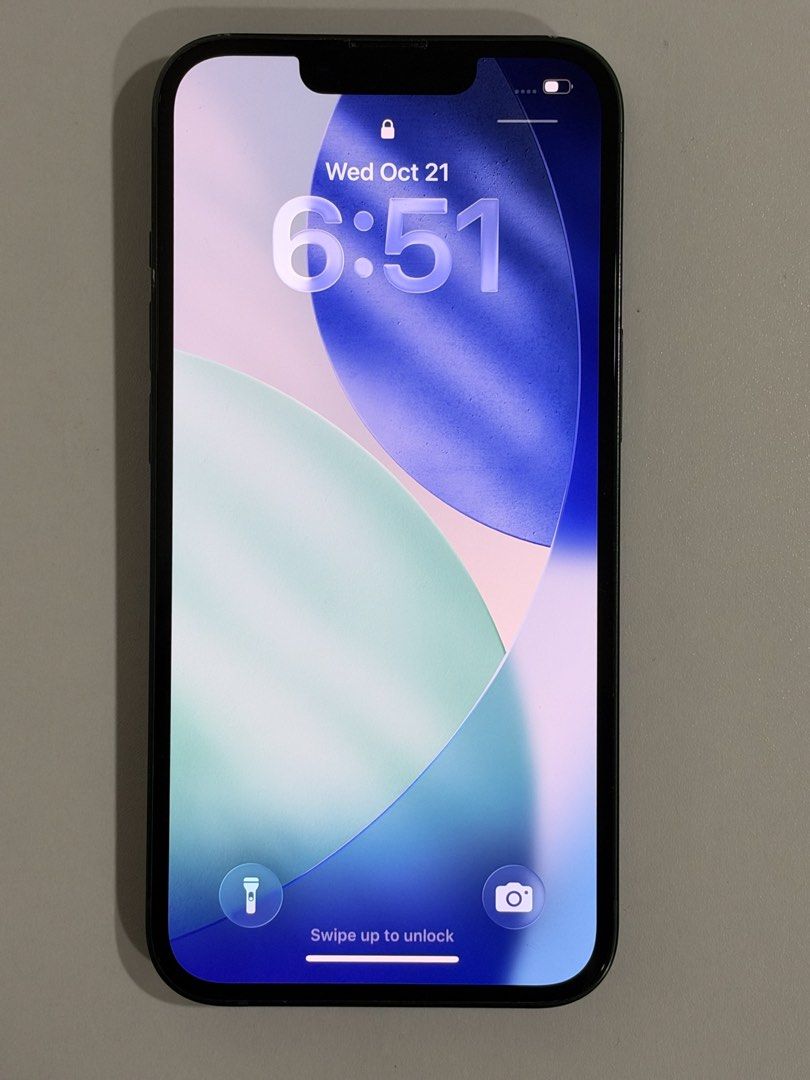 iPhone 13 (Category: iPhone 13 Series) located in Balagtas. Submitted by mrl_pchc (Listing ID 1469673930, Image 2). Description: Color: Green Storage: 128gb Batt Health: 75% No history of repair w/ slight dents and scratches Inclusion: Original box Original lightning cable Cases.