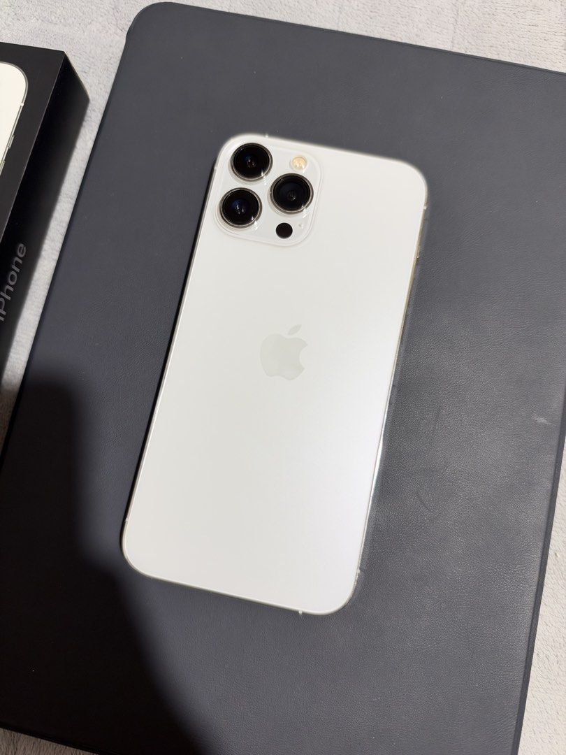 iPhone 13 pro max - 256 - silver - smart locked (Category: iPhone 13 Series) located in Bocaue. Submitted by benjjjfries (Listing ID 1469744937, Image 2). Description: For sale: iPhone 13 Pro Max, Silver, 128 gb - Smart Locked Status: 74% Battery Health. Genuine Apple Display - Mobile Care by Power Mac Center. Minimal scratches, no dents. With original box and cord. Free 10+ pcs girl phone case. Meet up around Bocaue. Can do shipping, buyer’s exp