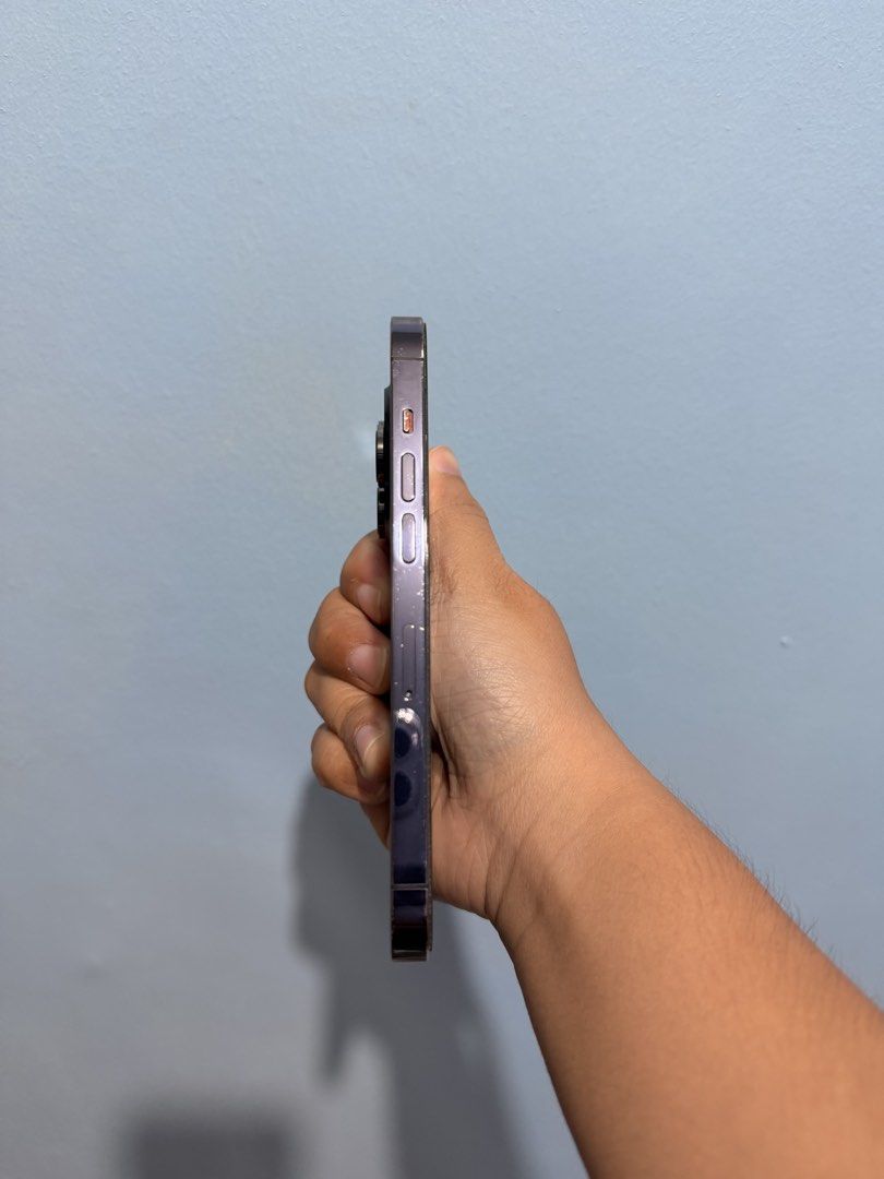 Iphone 14 pro 128gb deep purple (Category: iPhone 14 Series) located in Manila. Submitted by sopiiya_dfirst (Listing ID 1469756583, Image 3). Description: Iphone 14 pro 128gb Deep Purple • 74% battery health • No repair history • No sim restrictions • With scratches and dents pero it doesn’t affect the performance of the phone INCLUSIONS • box • Original charger and adaptor • 3 cases For meet ups only around San Jose del Monte, Bulacan. PM lang �