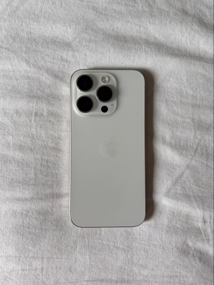 iPhone 15 Pro 128GB (Category: iPhone 15 Series) located in Manila. Submitted by gsells_ (Listing ID 1469583729, Image 2). Description: iPhone 15 Pro in White Titanium 128 GB Box included 82% battery health All original parts No dents, scratches No issues; all functions working RFS: Upgrade For sale only, not open for swaps.