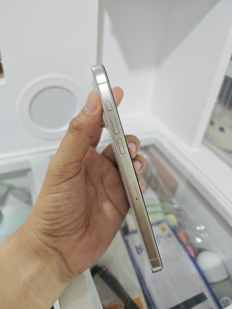 iPhone 15 Pro Max 256gb (Category: iPhone 15 Series) located in Cavite. Submitted by niks.siao (Listing ID 1469691565, Image 3). Description: For Sale or Swap iPhone 15 Pro Max | White Titanium| 256GB Price: 36,000 84% Percent Battery Health No Issue 100% Excellent Condition 🔎 Check all you want upon meetup 📦 Inclusions: Unit and Case only 📍Location Cavite .