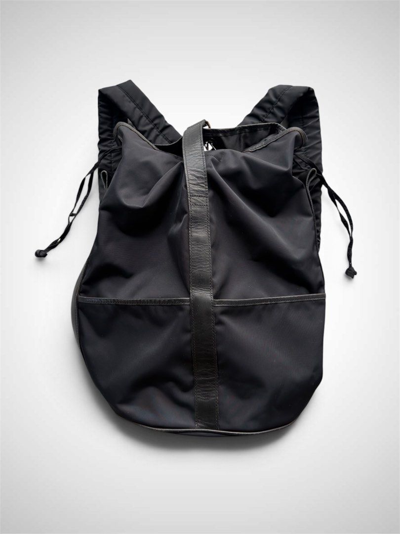 Issey Miyake 1990s Nylon Leather Rucksack Backpack (Category: Backpacks) located in Zamboanga. Submitted by the.angura.store (Listing ID 1469573093, Image 1). Description: Issey Miyake 1990s Nylon Leather Rucksack Backpack This piece is an archival nylon and leather modular rucksack from visionary Japanese designer Issey Miyake, originating in the late 1990s. Renowned for innovative fabric manipulation and utilitarian elegance, Miyake crafted acc
