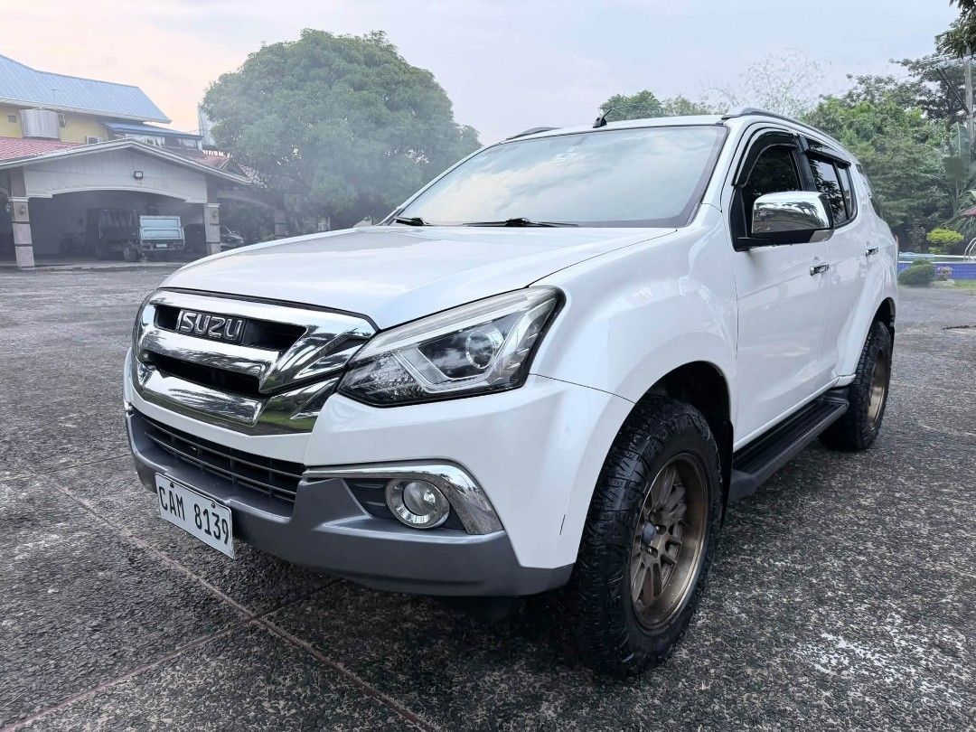 Isuzu Mu-X (Category: Used Cars) located in Manila. Submitted by eln_cars_dexter_uy (Listing ID 1469722808, Image 3). Description: 2019 ISUZU MUX BLUE POWER TOP OF THE LINE First owner acquired Pearl white Powerful engine yet economical Matic trans ( tiptronic + - ) All power Keyless entry Push start / smart key Steering control Touchscreen cd/dvd/ headunit With 10inch roofmount lcd monitor With back camera Power seat Leather seats New tires and 