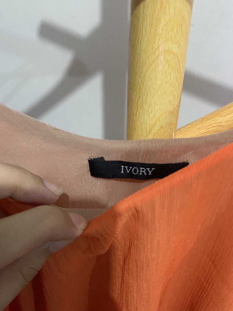 IVORY Orange Spaghetti Strap Layered Top/Mini dress (Category: Dresses) located in Muntinlupa City. Submitted by pink.poppies (Listing ID 1469656174, Image 3). Description: - super lightweight n flowy - its so pretty in person cam doesnt give it justice :( .