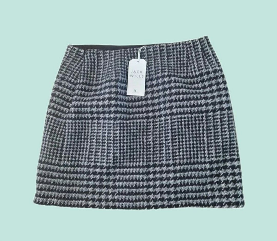 Jack Wills Checked Wool Blend Mini Skirt (Category: Skirts) located in Paranaque City. Submitted by calm_youngstore7 (Listing ID 1469583714, Image 2). Description: ON SALE FOR ONLY ₱799 EACH! - Brand: Jack Wills (Original tag attached) - Pattern: Classic houndstooth and checked in grey/black tones - Material: Structured wool-blend fabric - Fit: Clean straight hem and silhouette - Style: Minimalist, versatile for autumn and winter layering with ti