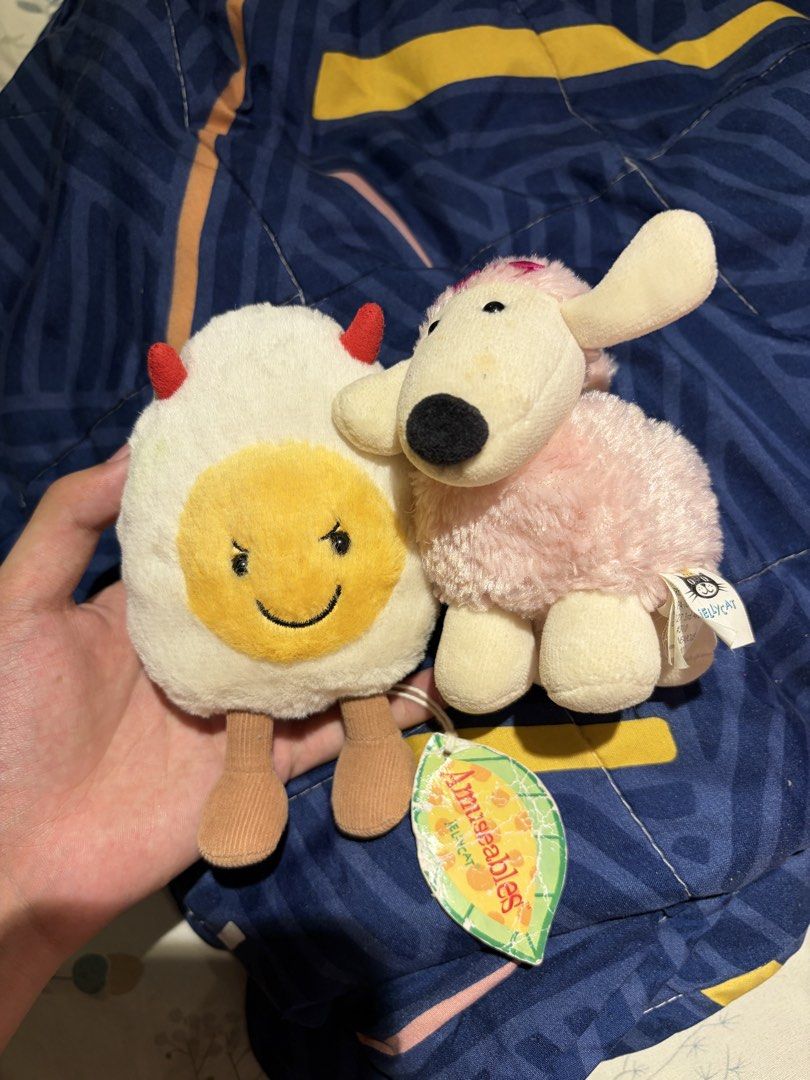 Jellycat Amuseables Deviled Egg and Pink Sheep plush toys (Category: Plushies & Soft Toys) located in Makati City. Submitted by squishycorner (Listing ID 1469707467, Image 1). Description: - Jellycat plushie bundle (2 pieces) - Includes Amuseables Deviled Egg (with red horns and corduroy legs) - Includes Fluffy Pink Sheep (with floppy ears and black nose) - Condition: Brand new with tags attached - Super soft, cuddly, and perfect for collectors -