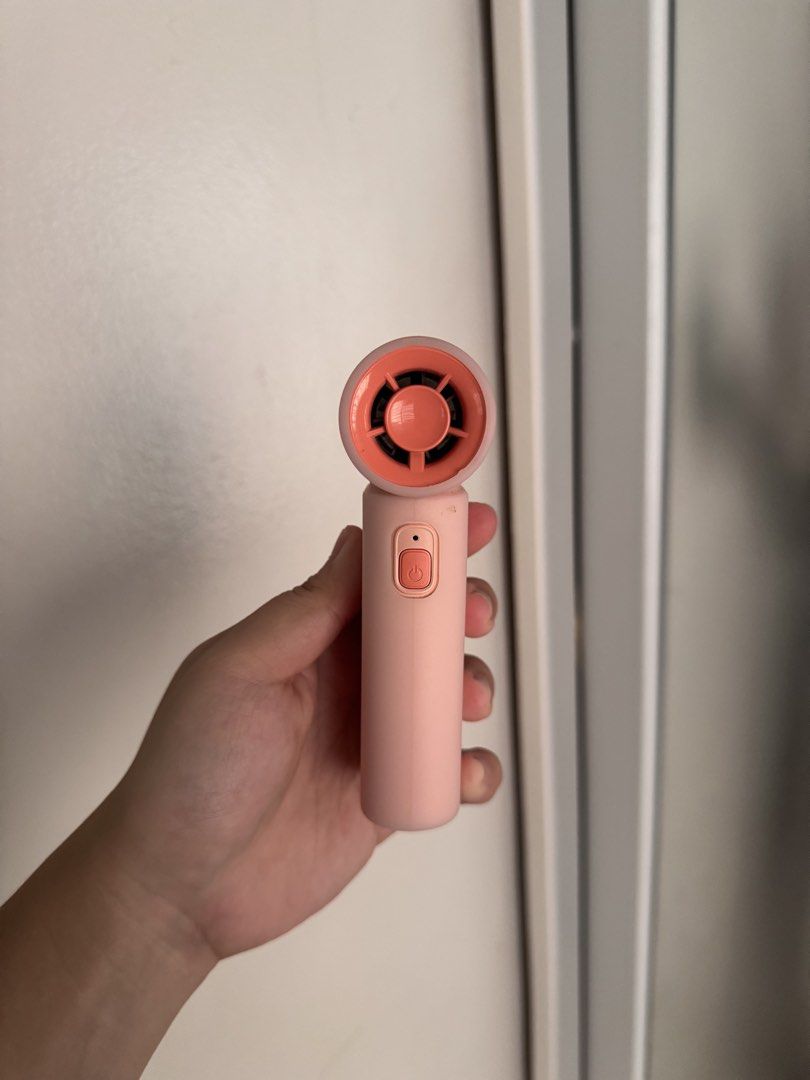 Jisulife Handheld Fan Pink (Category: Fans) located in Villasis. Submitted by thriftbyashi (Listing ID 1469638674, Image 2). Description: - No charger UNIT ONLY - Authentic Jisulife portable mini fan in a cute pink shade - Condition: Working great, well-maintained - Type-C rechargeable for easy and fast charging on the go - Compact and lightweight design, perfect for daily commute or travel - Adjustable speed settings with a handy power button ri