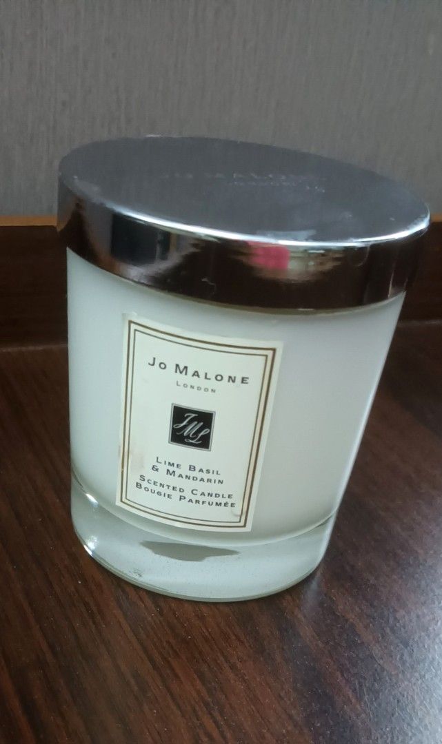 Jo Malone Scented Candle (Category: Home Fragrance) located in Mandaluyong City. Submitted by bestill4610 (Listing ID 1469712719, Image 2). Description: Authentic Jo Malone 200g Lime Basil & Mandarin (Signature Room Fragrance) Test-burned once. 98% content Mfd.2021. Still fresh! Stored well in a cool room Scent throw still great!👍 No box.
