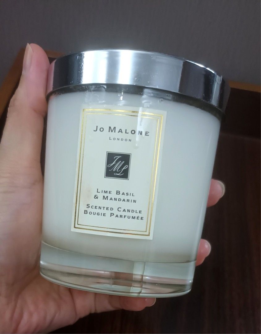 Jo Malone Scented Candle (Category: Home Fragrance) located in Mandaluyong City. Submitted by bestill4610 (Listing ID 1469712719, Image 3). Description: Authentic Jo Malone 200g Lime Basil & Mandarin (Signature Room Fragrance) Test-burned once. 98% content Mfd.2021. Still fresh! Stored well in a cool room Scent throw still great!👍 No box.