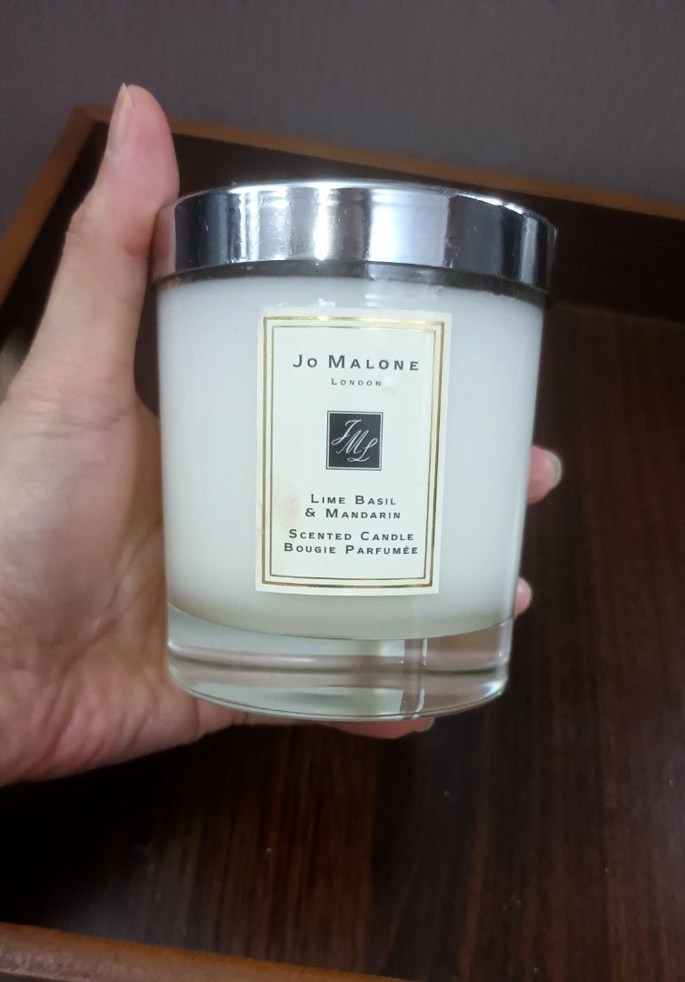 Jo Malone Scented Candle (Category: Home Fragrance) located in Mandaluyong City. Submitted by bestill4610 (Listing ID 1469712719, Image 1). Description: Authentic Jo Malone 200g Lime Basil & Mandarin (Signature Room Fragrance) Test-burned once. 98% content Mfd.2021. Still fresh! Stored well in a cool room Scent throw still great!👍 No box.