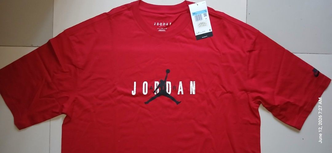 Jordan Brooklyn Oversized Red (Category: Tshirts & Polo Shirts ) located in San Mateo. Submitted by edayz709 (Listing ID 1469580542, Image 2). Description: - XL Fitting - W 24.5 × L 29 - Brand: Jordan - Condition: Brand new with original retail tags attached - Color: Bright red - Design: Classic Jumpman logo and bold text graphic on chest, with embroidered Nike logo on left sleeve .