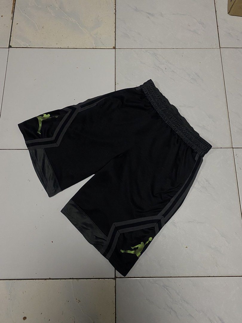 Jordan Diamond Shorts Black Green Size S (Category: Shorts) located in Manila. Submitted by _vnnnsss (Listing ID 1469718713, Image 1). Description: - Brand: Jordan - Color: Black with green Jumpman logo - Size: Small (S) - Material/Tech: Dri-FIT moisture-wicking technology - Features: Elastic waistband with stretch, geometric side panel striping - Origin: Made in Thailand - Condition: Excellent / Ready to wear.