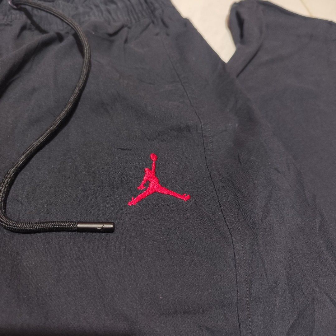 Jordan Essential Woven Nylon Pants (Category: Joggers) located in Manila. Submitted by buyybustt (Listing ID 1469684779, Image 3). Description: fits on 30-34 (best fit 32) length 39 embroidered jumpman logo see pic for some details including materials washtags etc 10/10 Conditon And Colaor Rate pm.