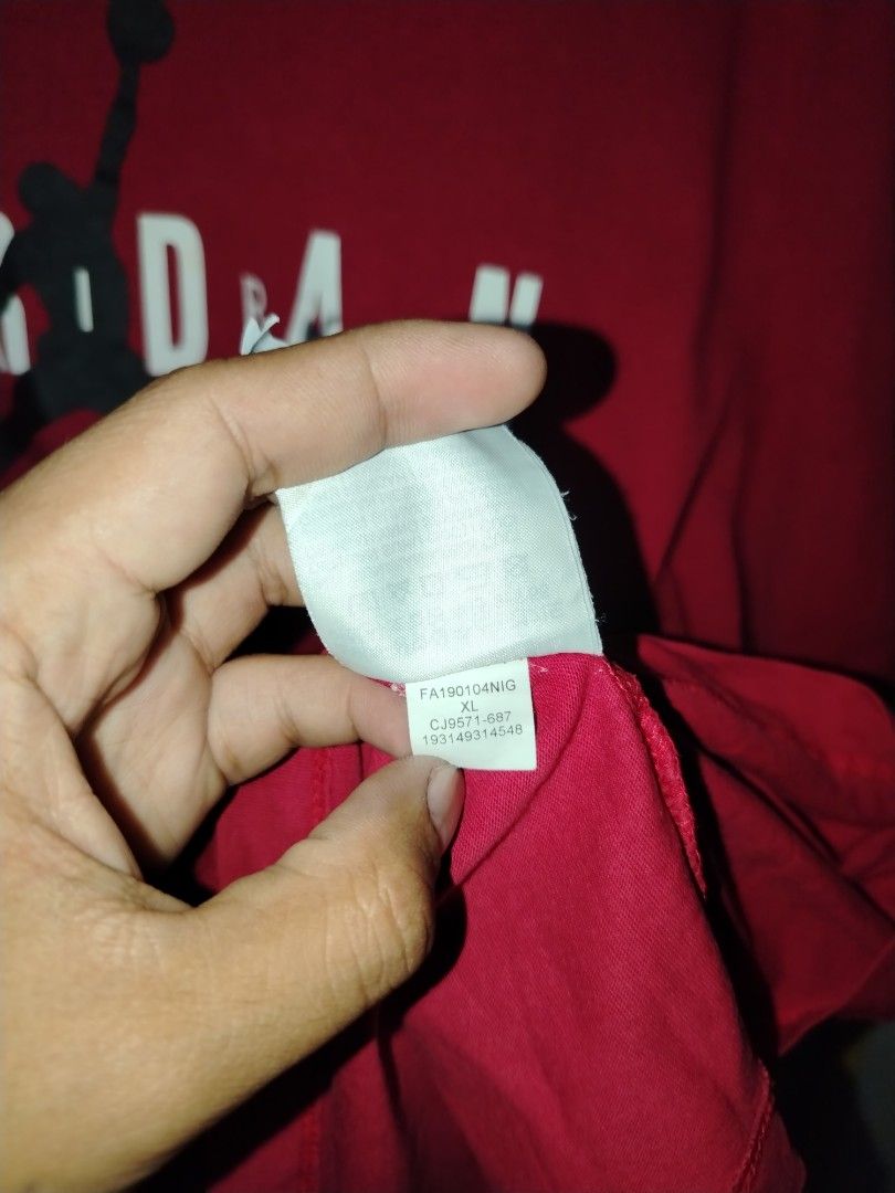 Jordan Red T-Shirt Size XL (Category: Tshirts & Polo Shirts ) located in Caloocan City. Submitted by vincefresn21903 (Listing ID 1469668233, Image 3). Description: - Brand: Jordan - Color: Red - Size: XL - Design: Jumpman logo and letter branding on the chest - Details: Short sleeves, crew neck - Authenticity: Style code CJ9571-687 on wash tag - Origin: Made in China.